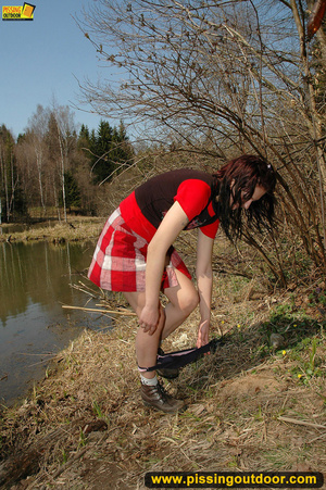 Young girl in sexy red dress in woods expose butt and spreads legs to piss - Picture 3