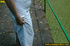 Seductive looking babe on a stroll raises clothes to pee out in the park