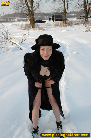 Lady in black coat and hat expose seductive ass and sprays hot pee on snow - Picture 16