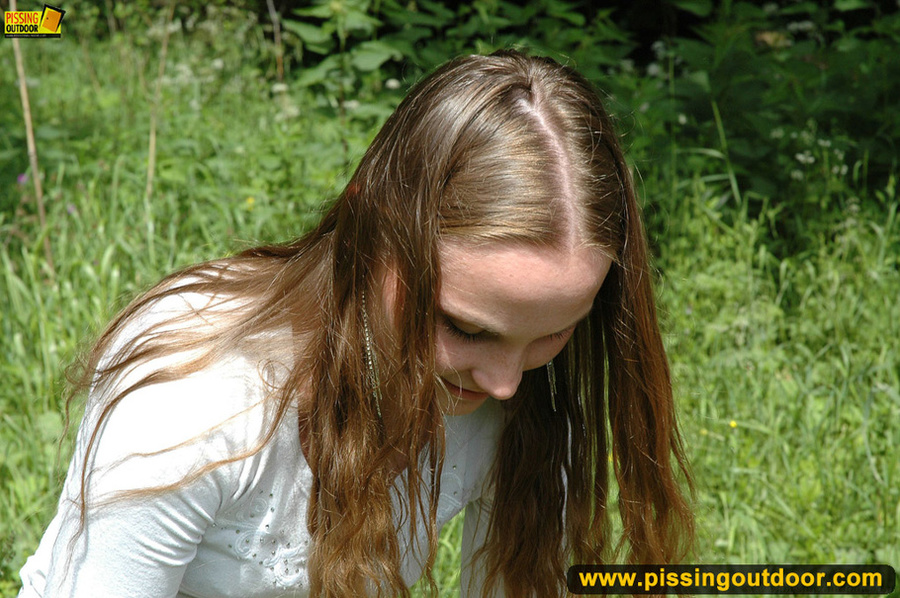 Very cute and young chick out in the woods enjoys pissing out in the woods - XXXonXXX - Pic 18