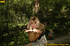 Naughty lusty babe has fun playing with her piss as she sprays in woods