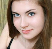 Dreamy young chick seductively poses for hot photos of her sexy booty