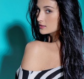 Seductive chick looking for fun strips to reveal inviting tits, pussy