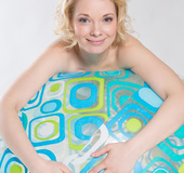Mischievous blonde teeny posing nude with a big ball