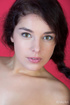 Busty brunette teen chick with a plait making boast of her delights