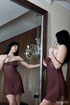 Big-titted brunette teen babe undresses preparing for the shooting