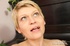Blonde momma with short hair strips nude and plays with golden sex toy
