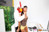 Ponytialed brunette with clamps on her tits jumping on a dick with her