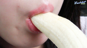 Young naughty hot Asian teen models her sexy body as she seductively eats banana - Picture 11