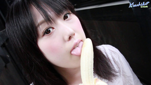 Young naughty hot Asian teen models her sexy body as she seductively eats banana - Picture 12