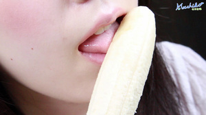Young naughty hot Asian teen models her sexy body as she seductively eats banana - Picture 13
