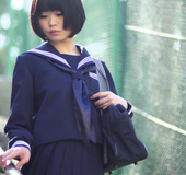 Real young and sexy Asian chick looks extra sweet in blue sailor’s dress