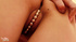 Hot looking young girl uses her sexy bead thong to play with her hot pussy