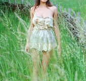 Countryside girl shows the yard and her chocolate skin