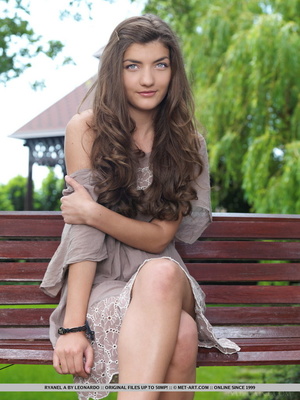 Cute teen lays on bench for an afternoon - Picture 1