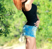Cute redhead decides to walk and play in the woods