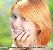 Cute redhead decides to walk and play in the woods