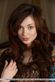 Sweet young beauty was made for golden leather beds