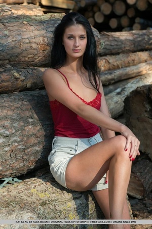 Lumber yard is the place for brunette to - Picture 2