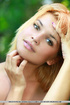 Blond hippie-chic uncovers her plump pussy lips