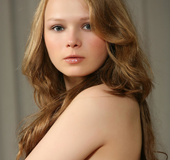 Very young strawberry blonde bares her snatch in parent's bedroom