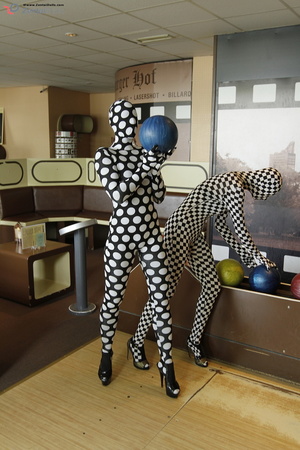 Two black and ping zentai wearing girls  - Picture 1