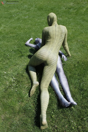 Two green and grey zentai wearing flexib - Picture 4