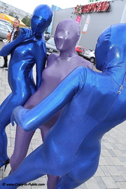 Two sexyblue zentai and one violett wearing chicks exposing their gorgeous body outdoor.
