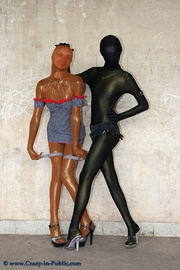 Two dressy black and brown zentai wearing teen showing off their amazing bodys.