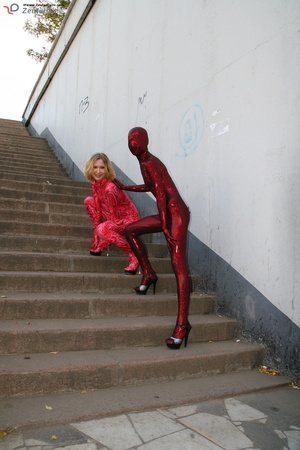 Two horny red zentai wearing chick expos - XXX Dessert - Picture 9
