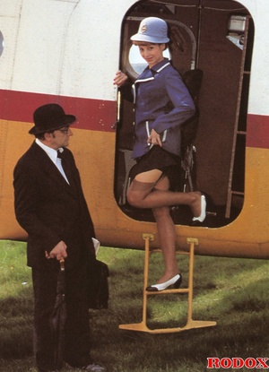A retro flight attendant enjoys screwing - Picture 1