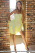 Tasty young chick in yellow dress strips to reveal hot tits, cool ass