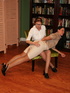 Hot black haired beauty with lusciously formed legs gets her ass spanked