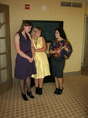 These two curvy milfs get their big booties spanked by a randy black haired milf. - Picture 2
