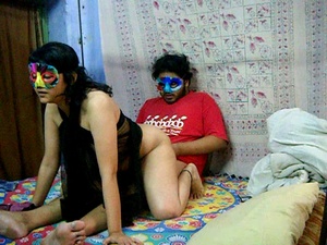 Horny Indian dude in a mask pounding hard hot chick in transparent gown - Picture 1