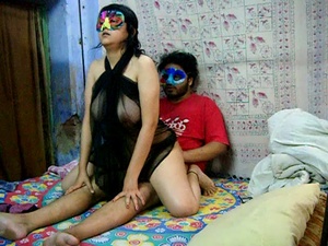 Horny Indian dude in a mask pounding hard hot chick in transparent gown - Picture 2