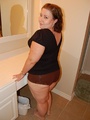 Tattoed bbw milf slowly taking off her - Picture 1