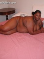 Pretty ebony BBW wife lying on the bed - Picture 10