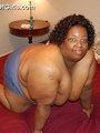Check out enormous ebony mom stips naked - Picture 9