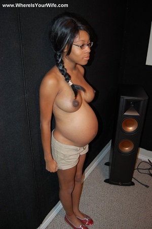 Busty pregnant black housewife exposing  - Picture 1