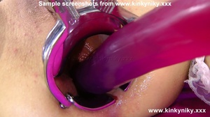 Kinky blondie with a speculum in her ass pounding herself with a long pink dildo - Picture 3