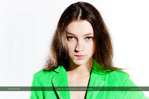 Green top wearing brunette teen exposing - Picture 3