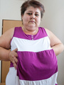 BBW in a striped dress demonstrating her - Picture 4