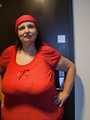Funny mature bitch in a red T-shirt and - Picture 1
