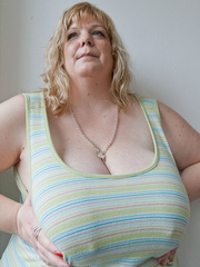 Slutty blonde bbw teasing you with her milky titties - Picture 6