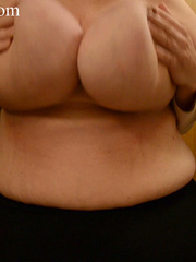 Big-titted fatty posing on cam with her juggs hanging - Picture 6