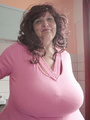 Curly brunette bbw in a pink pullover - Picture 3