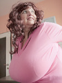 Curly brunette bbw in a pink pullover - Picture 6