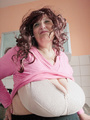 Curly brunette bbw in a pink pullover - Picture 8