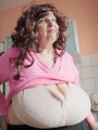 Curly brunette bbw in a pink pullover - Picture 9